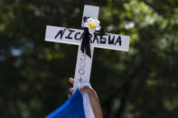 Nicaragua supporters protest outside of the Organization of the American States asking to free political prisioners and stop the government's human rights violations against critics, during a rally in Washington, Wednesday, June 23, 2021. (AP Photo/Jose Luis Magana)