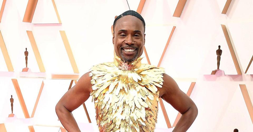 Billy Porter Arrives at the Oscars like a Fashion Phoenix in Golden Feather Top and Ball Skirt