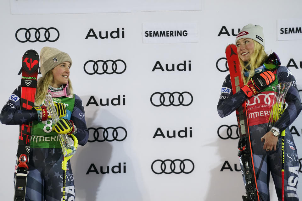 FILE - United States' Mikaela Shiffrin, right, winner of an alpine ski, World Cup women's slalom, celebrates on the podium with second placed United States' Paula Moltzan, in Semmering, Austria, Thursday, Dec. 29, 2022. When Paula Moltzan finished second behind Mikaela Shiffrin for the U.S. ski team’s first 1-2 finish in a women’s World Cup slalom in more than half a century recently, it was easy to assume that her more successful teammate was her main inspiration. (AP Photo/Giovanni Auletta, File)