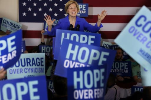 Democratic presidential candidate Elizabeth Warren addresses her supporters during a caucus night rally in Des Moines, Iowa