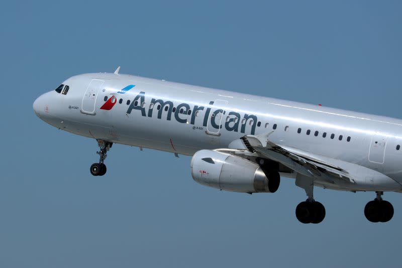 FILE PHOTO: An American Airlines Airbus A321 plane takes off from Los Angeles International airport