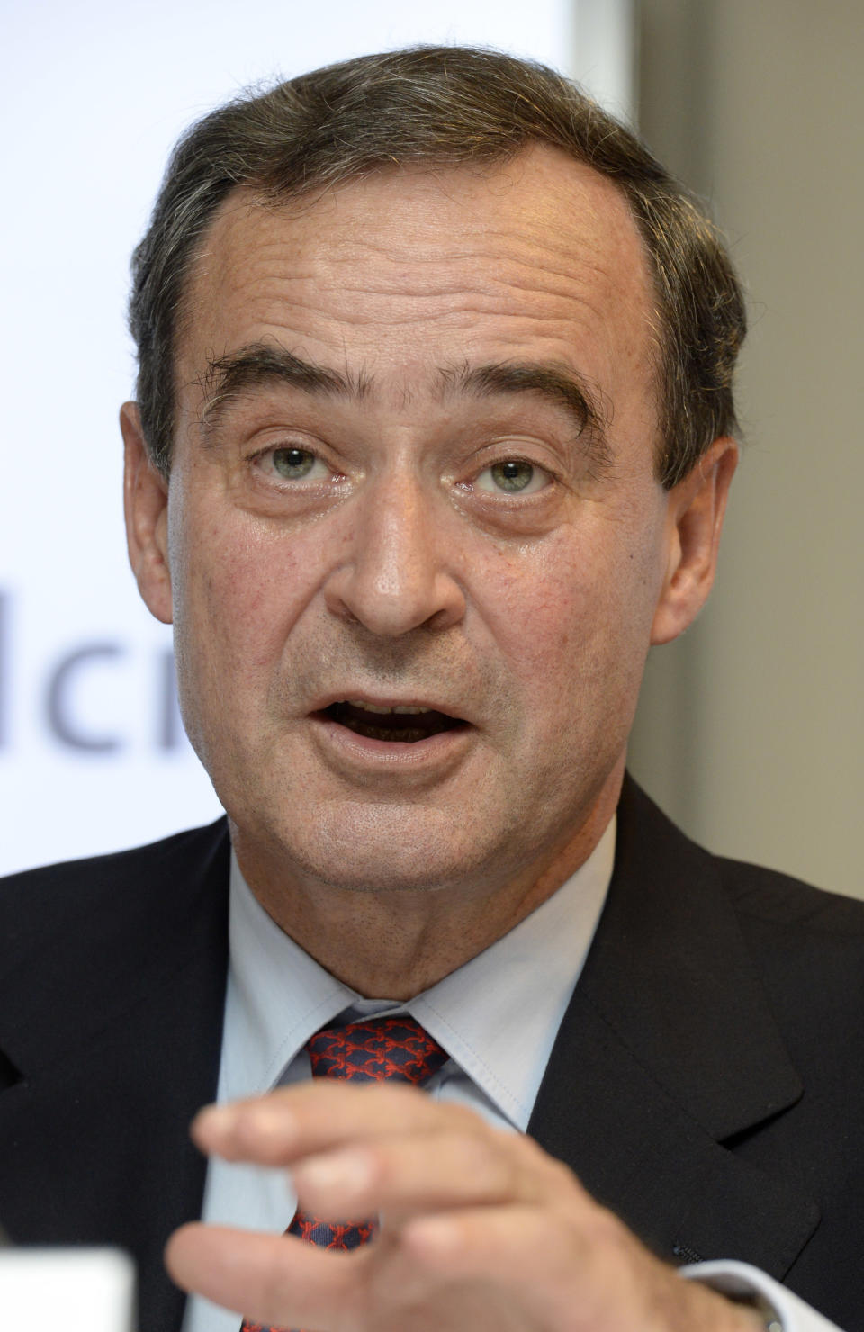 Bruno Lafont, future chairman of LafargeHolcim speaks at a news conference in Zurich, Switzerland, Monday, April 7, 2014. Swiss-based Holcim and its French counterpart, Lafarge, two of the world's largest suppliers of building materials announced plans for a "merger of equals" Monday that would create an industry giant with a combined 32 billion euros (US dollar 44 billion) in annual revenues. (AP Photo/Keystone, Steffen Schmidt)