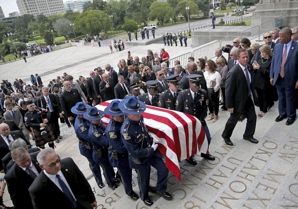 The casket is brought into the Louisiana State Capital building during an honor procession for former Louisiana Gov. Kathleen Babineaux Blanco, on the front steps of the state Capitol in Baton Rouge, La., Thursday, Aug. 22, 2019. Thursday was the first of three days of public events to honor Blanco, the state's first female governor who died after a years long struggle with cancer.(AP Photo/Michael Democker, Pool)