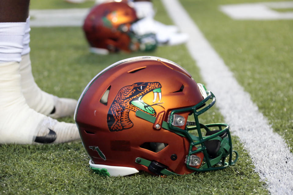 FILE - A Florida A&M helmet sports the Rattlers logo before an NCAA college football game against North Carolina in Chapel Hill, N.C., Saturday, Aug. 27, 2022. Florida A&M has banned its players from the team's facilities after a rap video featuring some Rattlers was shot in their locker room without proper permission being granted. Coach Willie Simmons told The Associated Press on Saturday, July 22, 2023, the team facility, weight room and access to the stadium field were off limits to all the players until he and the administration could sort out who was involved in the video shoot. (AP Photo/Chris Seward, File0