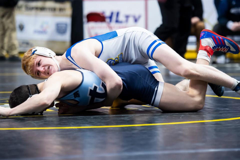 Northern Lebanon's Aaron Seidel (top) wrestles Central Valley's Antonio Boni in a 121-pound first round bout at the PIAA Class 2A Wrestling Championships at the Giant Center on March 7, 2024, in Hershey. Seidel won by fall at 1:30.