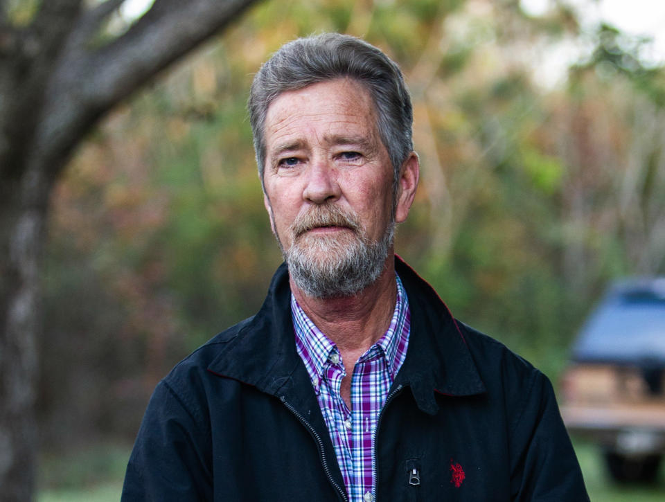 FILE - In this Dec. 5, 2018 file photo, Leslie McCrae Dowless Jr. poses for a portrait outside of his home in Bladenboro, N.C. The Republican in the nation’s last undecided congressional election said Monday, Feb. 11, 2019 he recruited a political operative now at the center of a ballot fraud investigation because he produced election results in his rural North Carolina county and other Republicans vouched for him. Mark Harris said he didn’t know before November’s election that state elections board investigators found evidence that operative Dowless Jr. may have illegally handled ballots in 2016. (Travis Long/The News & Observer via AP, File)