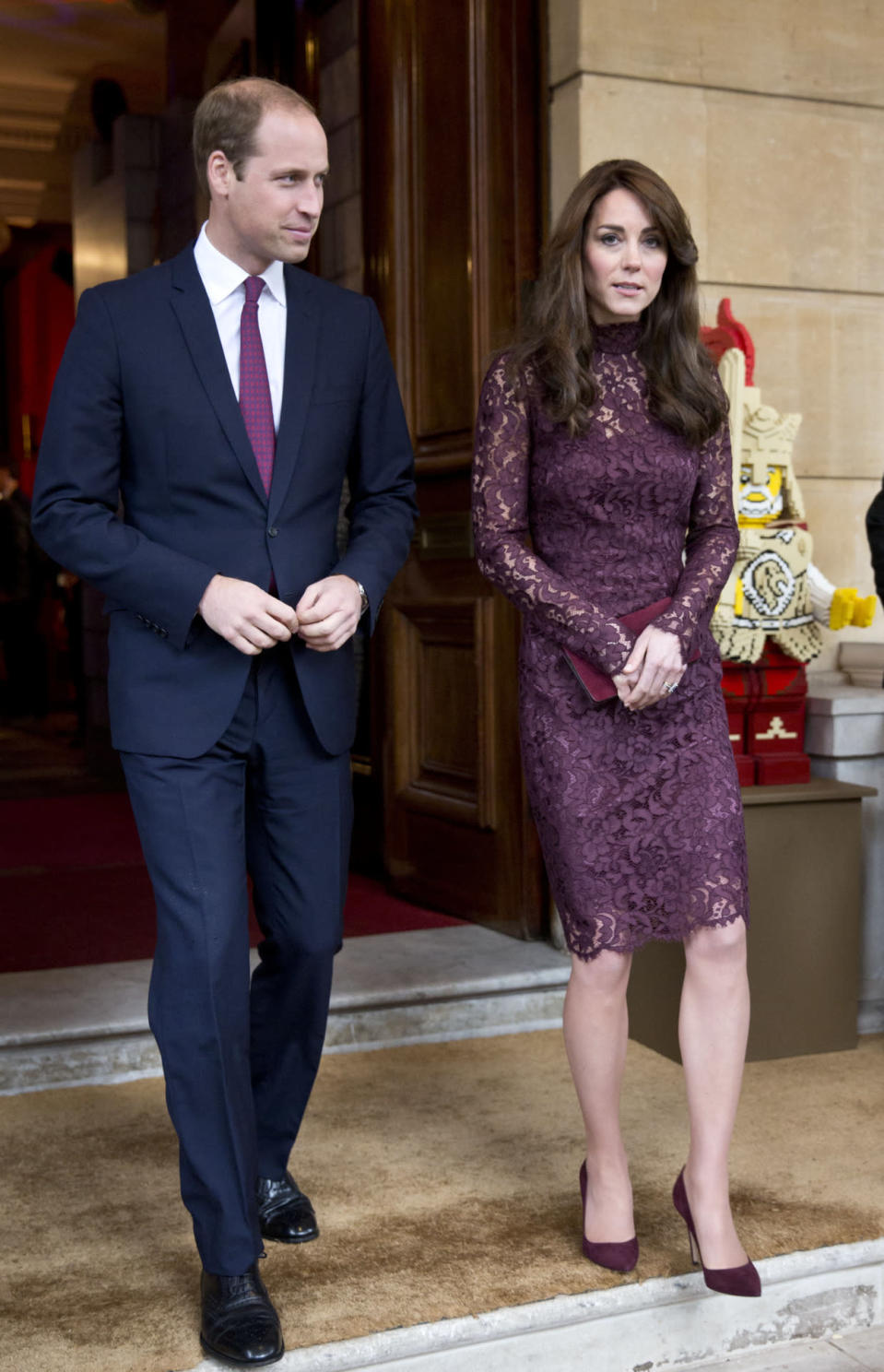 <p>Kate met the President of China in London in a lacy plum dress designed by Dolce & Gabbana. She teamed the look with matching Gianvito Rossi heels and a red Mulberry clutch.</p><p><i>[Photo: PA]</i></p>