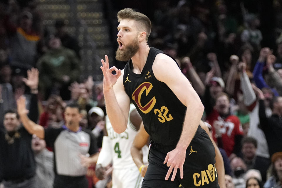 Cleveland Cavaliers forward Dean Wade (32) celebrates a three point basket in the second half of an NBA basketball game against the Boston Celtics, Tuesday, March 5, 2024, in Cleveland. (AP Photo/Sue Ogrocki)