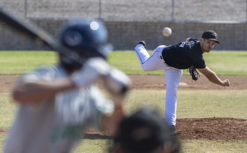 THOUSAND OAKS, CA - JUNE 27: Minor league pitcher Jeff Johnson pitches during a scrimmage with high school players at Waverly Park on Saturday, June 27, 2020 in Thousand Oaks, CA. (Brian van der Brug / Los Angeles Times)