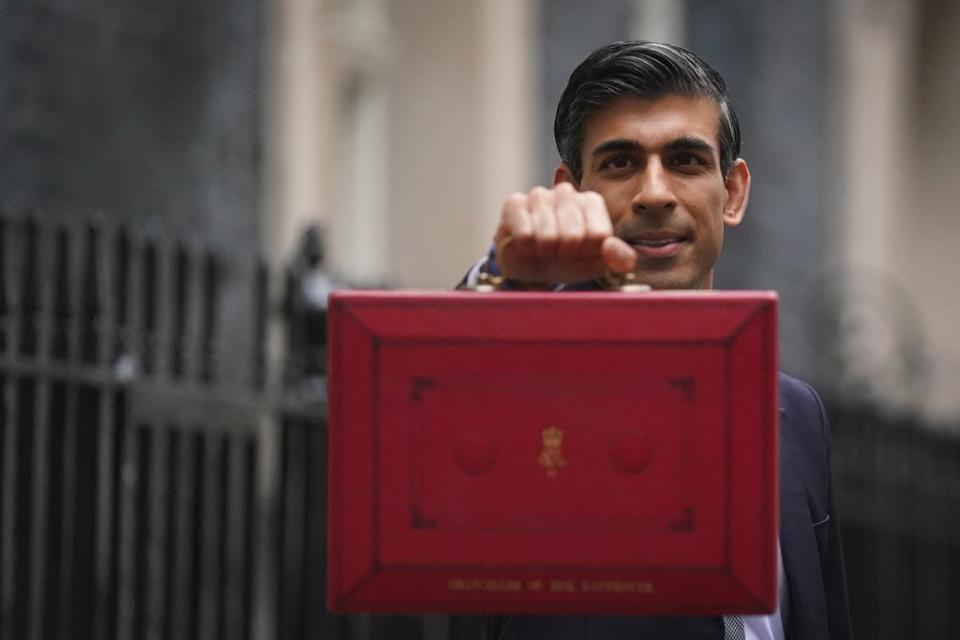 Chancellor Rishi Sunak leaves 11 Downing Street before delivering his Budget to the House of Commons (PA) (PA Wire)