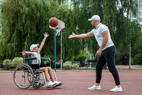 <span class="caption">For PE to accessible to students of all abilities, student teachers need training and experience </span> <span class="attribution"><a class="link " href="https://www.shutterstock.com/fr/image-photo/dad-plays-his-disabled-son-on-2027485346" rel="nofollow noopener" target="_blank" data-ylk="slk:Marko Aliaksandr;elm:context_link;itc:0;sec:content-canvas">Marko Aliaksandr</a></span>