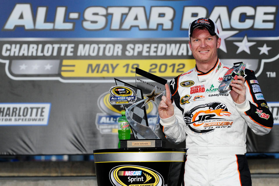 CHARLOTTE, NC - MAY 19: Dale Earnhardt Jr., driver of the #88 Dale Jr. Foundation/National Guard/Diet Mountain Dew Chevrolet, celebrates in victory lane after winning the NASCAR Sprint Showdown at Charlotte Motor Speedway on May 19, 2012 in Charlotte, North Carolina. (Photo by Jared C. Tilton/Getty Images)