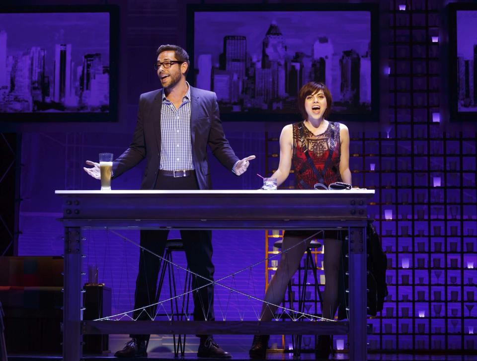 This theater publicity image released by The Hartman group shows Zachary Levi, left, and Krysta Rodriguez during a performance of the musical "First Date," at the Longacre Theatre in New York. (AP Photo/The Hartman Group, Joan Marcus)