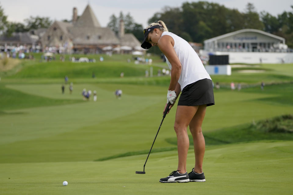 Lexi Thompson sinks her putt on the 10th green in the second round of the Cognizant Founders Cup LPGA golf tournament, Friday, Oct. 8, 2021, in West Caldwell, N.J. (AP Photo/John Minchillo)