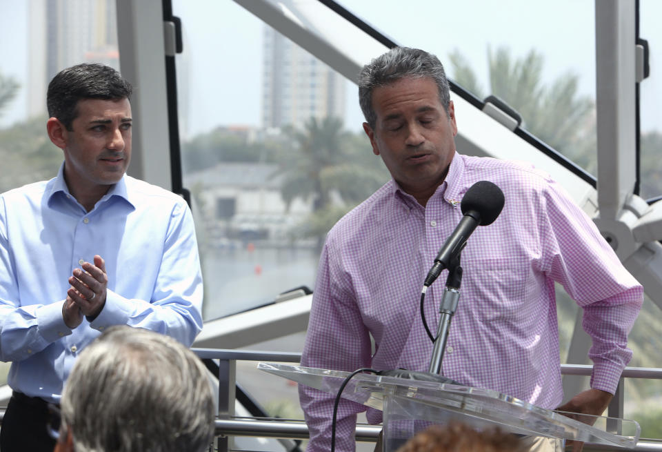 Tampa Bay Rays Principal Owner Stuart Sternberg reacts while answering questions at a press conference at the Dali Museum in St. Petersburg, Fla., Tuesday, June 25, 2019. Sternberg spoke about exploring the prospect of playing some future home games in Montreal. At left is Rays President of Baseball Operations Matthew Silverman. (Scott Keeler/Tampa Bay Times via AP)