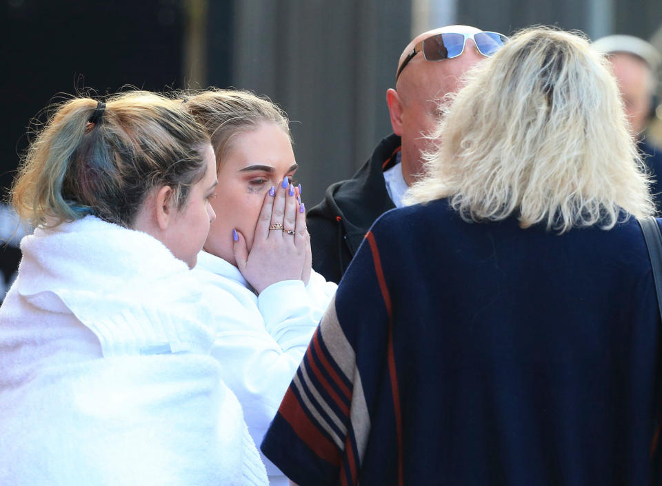 <p>Fan leaves the Park Inn hotel in central Manchester, England, Tuesday, May 23, 2017. (AP Photo/Rui Vieira) </p>