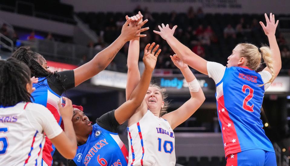 Indiana All-Star Juliann Woodard (10) shoots the ball against Kentucky All-Star Reagan Bender (2) on Saturday, June 8, 2024, during the girls seniors All-Star game at Gainbridge Fieldhouse in Indianapolis. Indiana All-Stars defeated the Kentucky All-Stars.