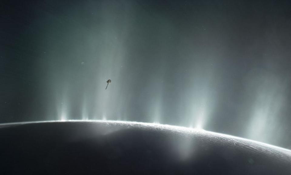 Nasa artist impression of the Cassini spacecraft diving through the Enceladus plume.