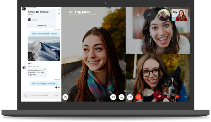A laptop showing Skype orchestrating a three-person video call