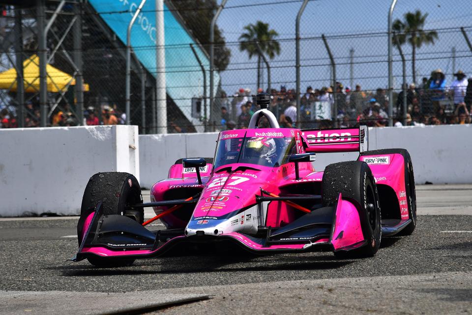 Apr 16, 2023; Long Beach, California, USA; Andretti Autosport driver Kyle Kirkwood (27) of United States rolls into victory lane following his victory of the Grand Prix of Long Beach at Long Beach Street Circuit. Mandatory Credit: Gary A. Vasquez-USA TODAY Sports