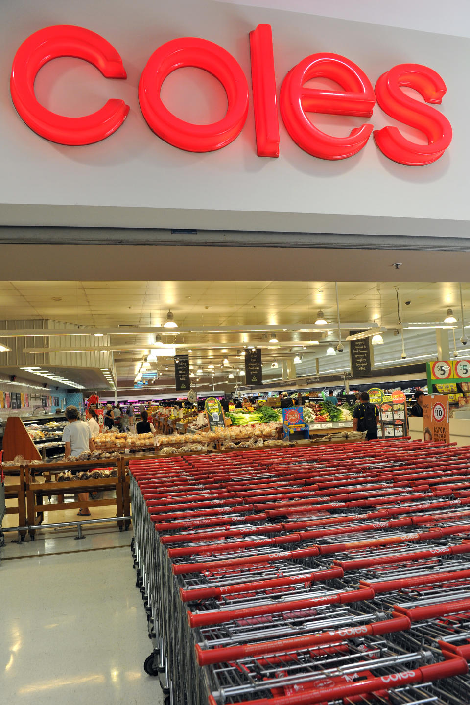 A Coles supermarket with trolleys outside is pictured in this file image.