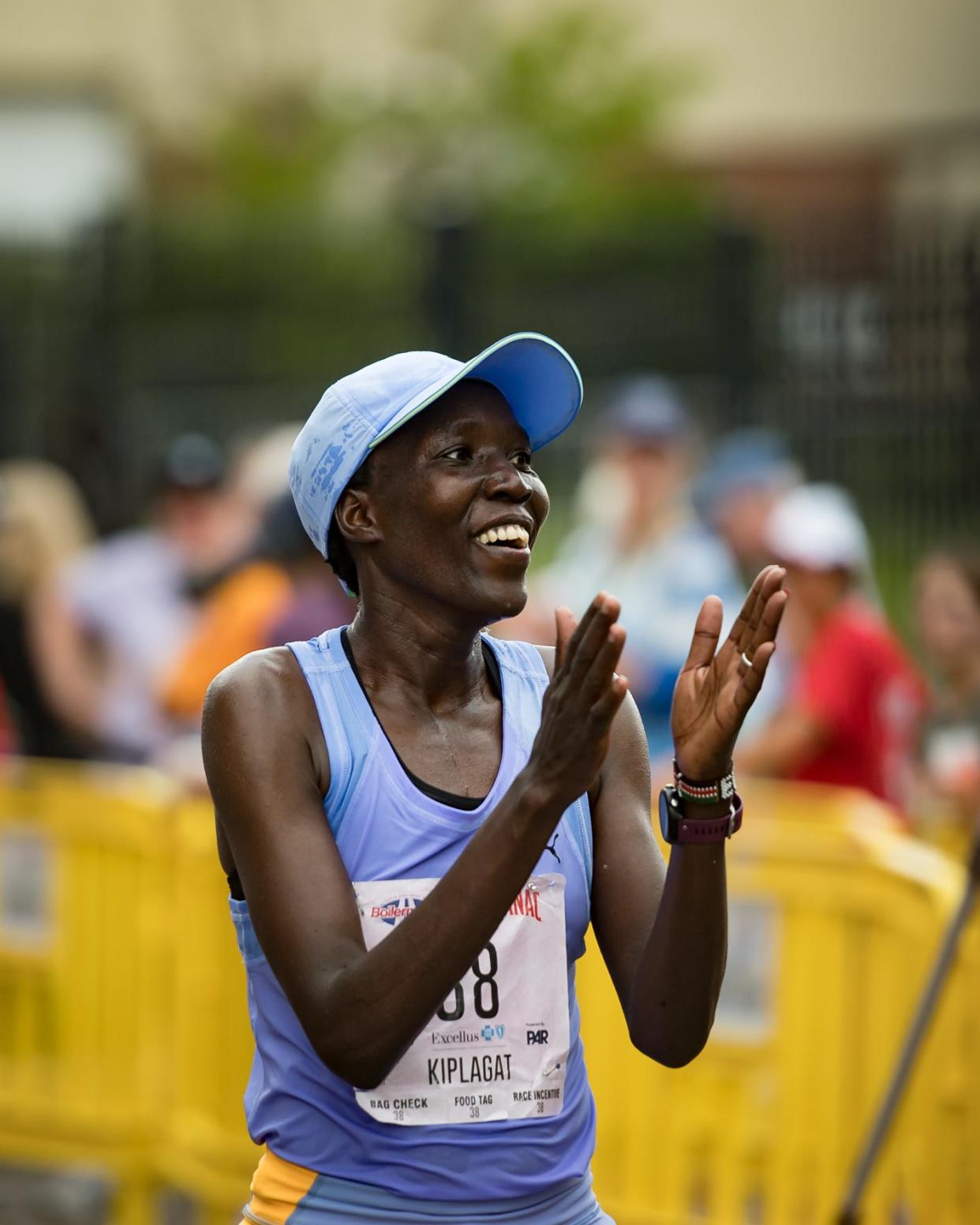 Edna Kiplagat of Longmont, CO crosses the finish line of the Boilermaker 15K Road Race in Utica, NY on Sunday, July 9, 2023.