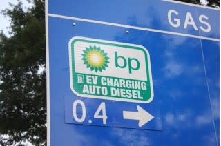 Highway sign for electric-car fast-charging station at BP in Metrolina area of Charlotte, NC