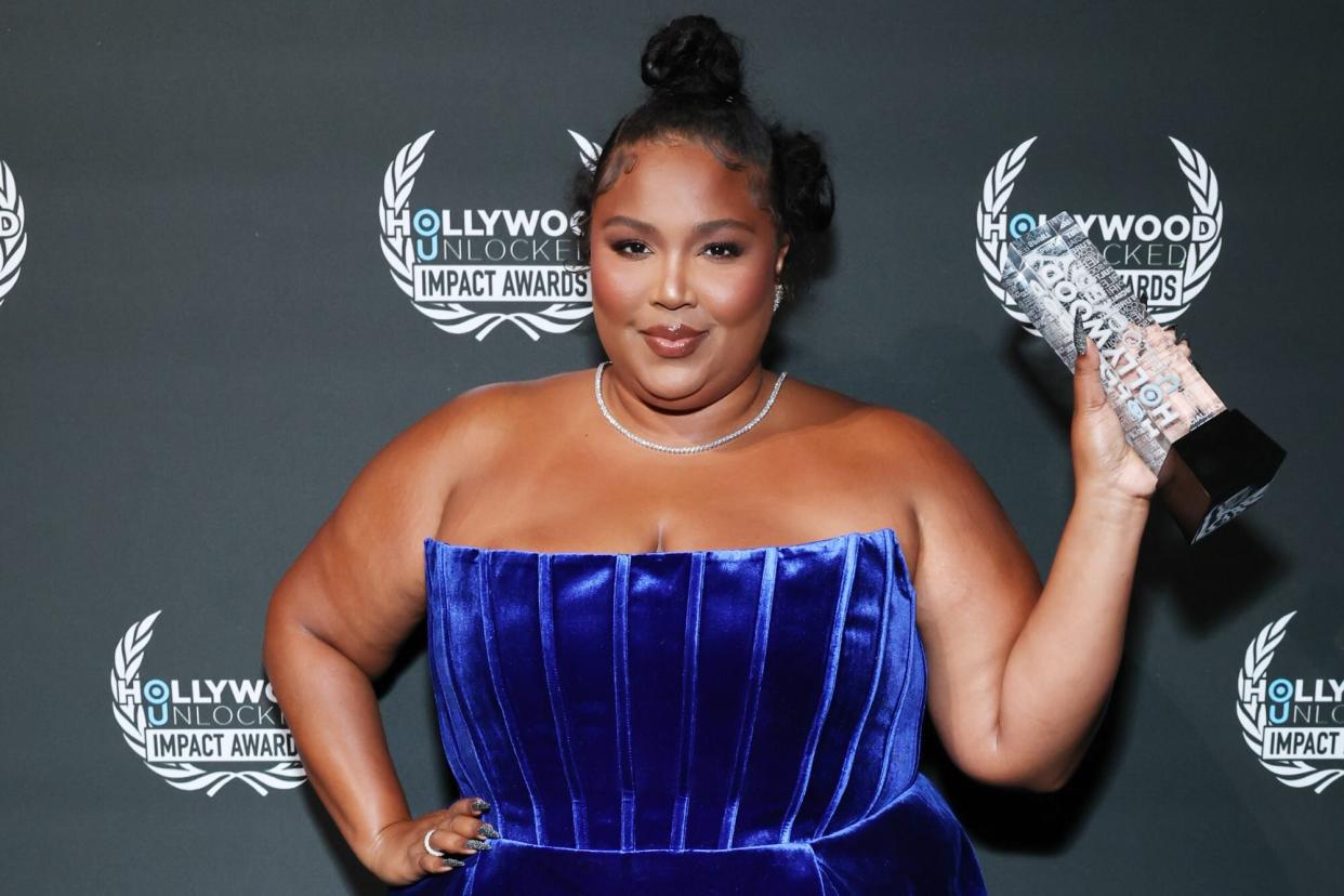 BEVERLY HILLS, CALIFORNIA - JUNE 24: Lizzo poses backstage during the 2nd annual Hollywood Unlocked Impact Awards at The Beverly Hilton on June 24, 2022 in Beverly Hills, California. (Photo by Randy Shropshire/Getty Images for Hollywood Unlocked)