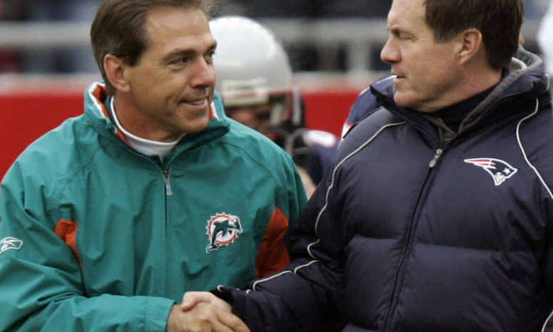 Nick Saban and Bill Belichick on the sideline.