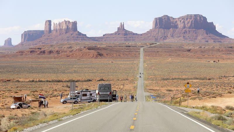 Tourists stop to take photos in Oljato-Monument Valley, San Juan County, on Friday, Oct. 1, 2021.  The Department of Commerce has awarded a large grant to increase broadband access in Utah.  