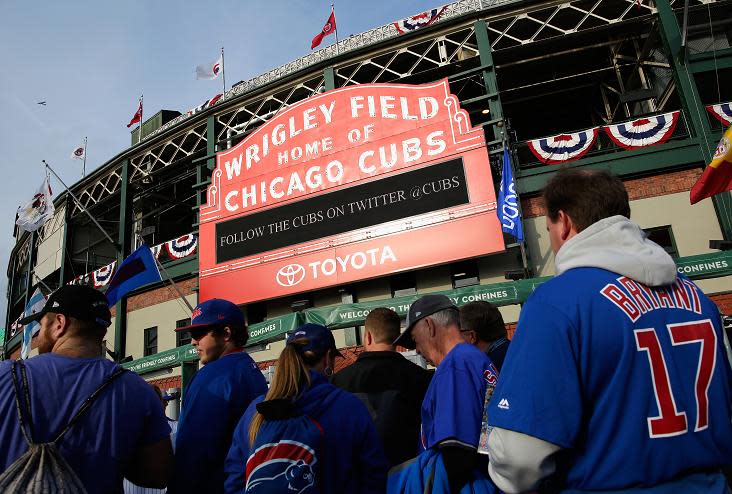Fans are seen outside of Wrigley Field prior to game one of the National League Championship Series. (AP)