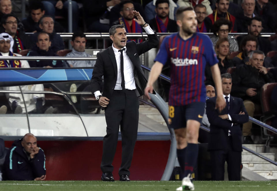 Barcelona coach Ernesto Valverde gestures during the Champions League semifinal, first leg, soccer match between FC Barcelona and Liverpool at the Camp Nou stadium in Barcelona Spain, Wednesday, May 1, 2019. (AP Photo/Joan Monfort)