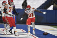 Kansas City Chiefs' Darrel Williams, right, celebrates his touchdown during the second half of an NFL football game against the Buffalo Bills, Monday, Oct. 19, 2020, in Orchard Park, N.Y. (AP Photo/Adrian Kraus)