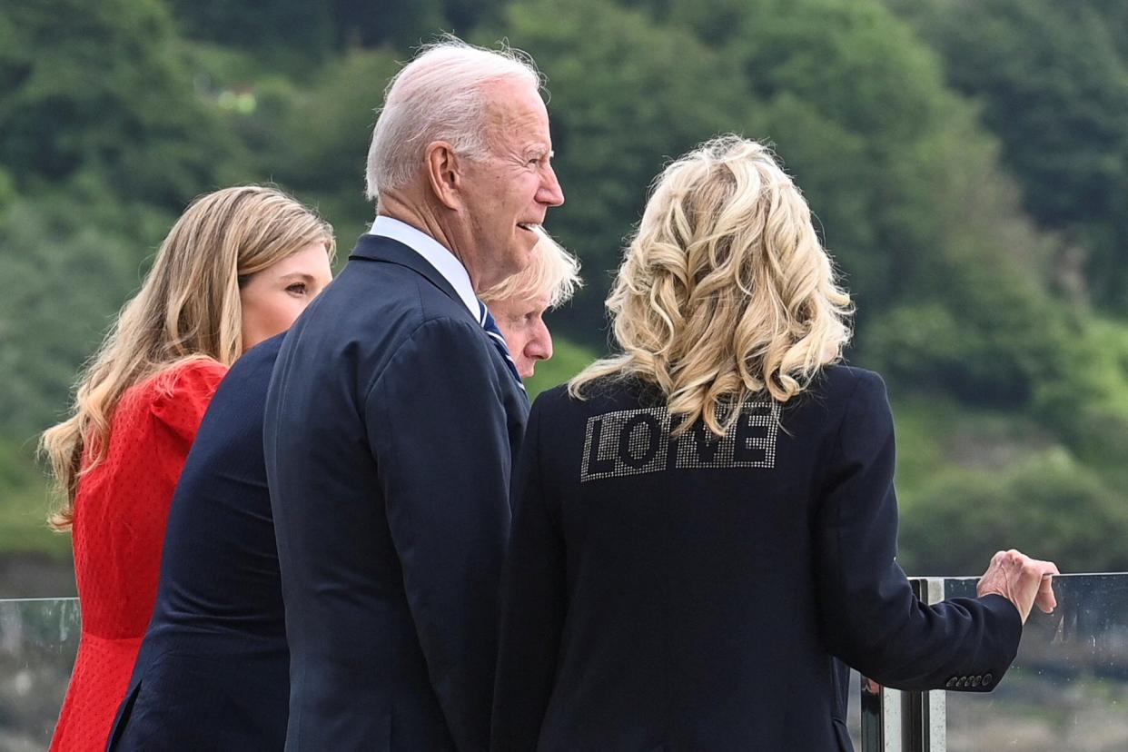 Dr Jill Biden wears a jacket with the word “Love” written on the back in London. (POOL/AFP via Getty Images)