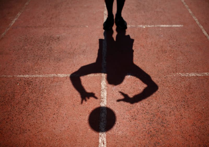 FILE PHOTO: The shadow of a player is being cast on the ground during the first South Asia LGBT Sports Festival in Kathmandu