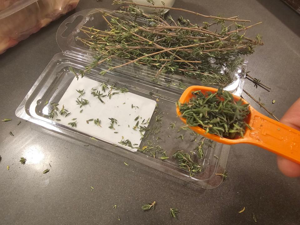 Thyme in a plastic container