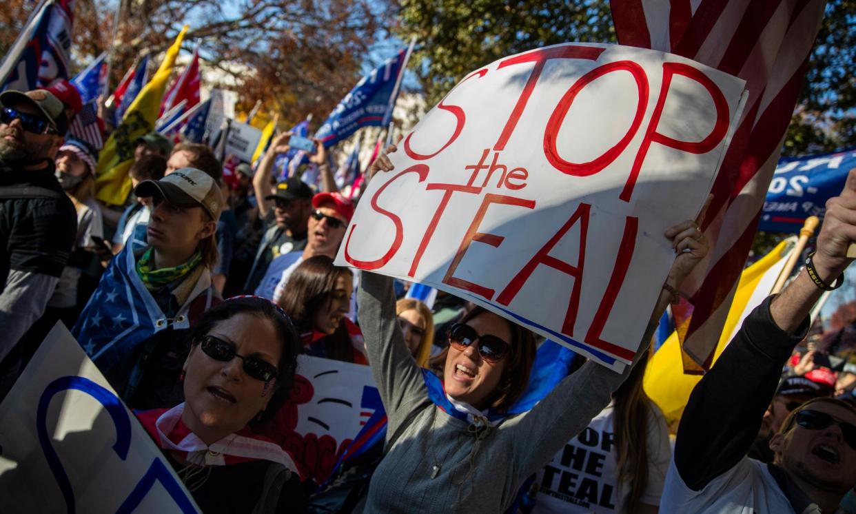 <span>Donald Trump supporters at the supreme court in Washington DC, on 14 November 2020.</span><span>Photograph: Shawn Thew/EPA</span>