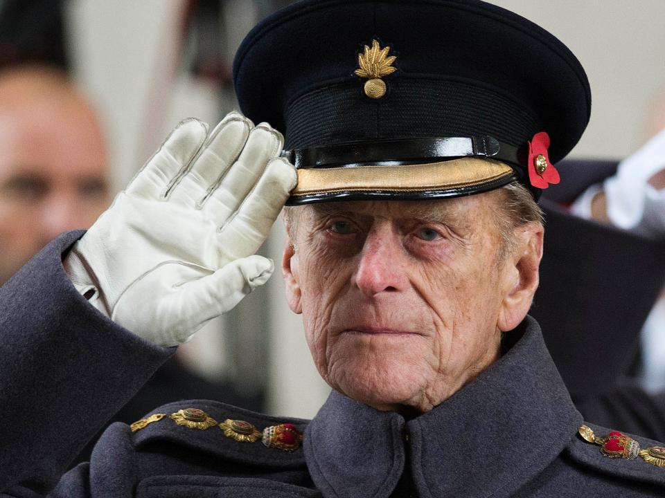 Prince Philip salutes during a special Armistice Day ceremony under the Menin Gate in Ypres, Belgium, on 11 November 2013 (AP)