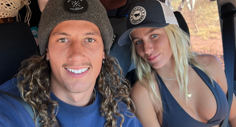 OnlyFans creators Nathan Soligo (left) and Rebecca McLeod pictured in a car.