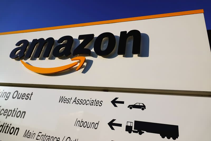 The logo of Amazon is seen at the company logistics center in Lauwin-Planque