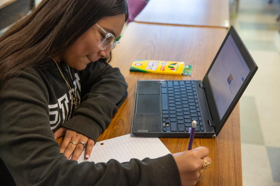 Fifth grade student Rayanne Acevedo writes down facts about states during an aftercare program at Garcia Elementary School on Thursday, March 28, 2024, in Corpus Christi, Texas.