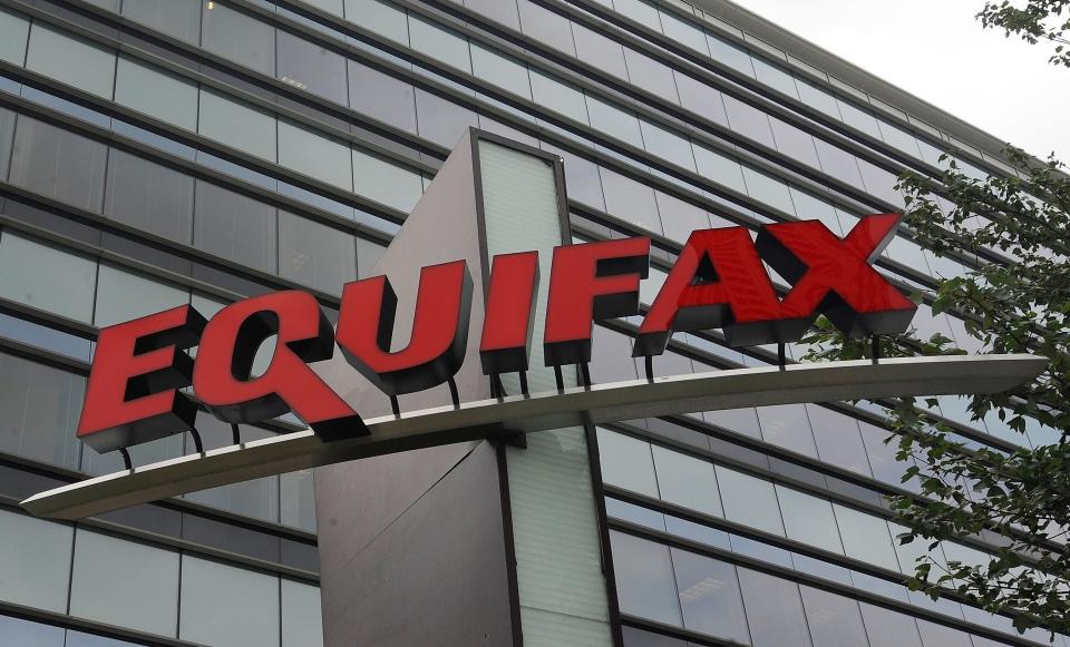 File photo taken in 2012 shows a corporate sign at the headquarters of Equifax in Atlanta, Ga.