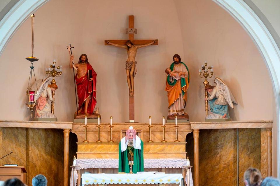 Father Ron Knudsen says the last Mass at St. Rita of Cascia on Wednesday, June 8, 2022, in Tacoma.