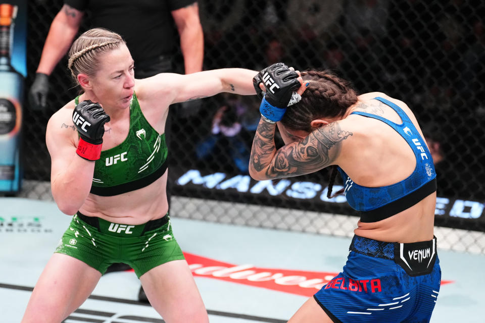 LAS VEGAS, NEVADA – FEBRUARY 03: (L-R) Molly McCann of England punches Diana Belbita of Romania in a strawweight fight during the UFC Fight Night event at UFC APEX on February 03, 2024 in Las Vegas, Nevada. (Photo by Chris Unger/Zuffa LLC via Getty Images)