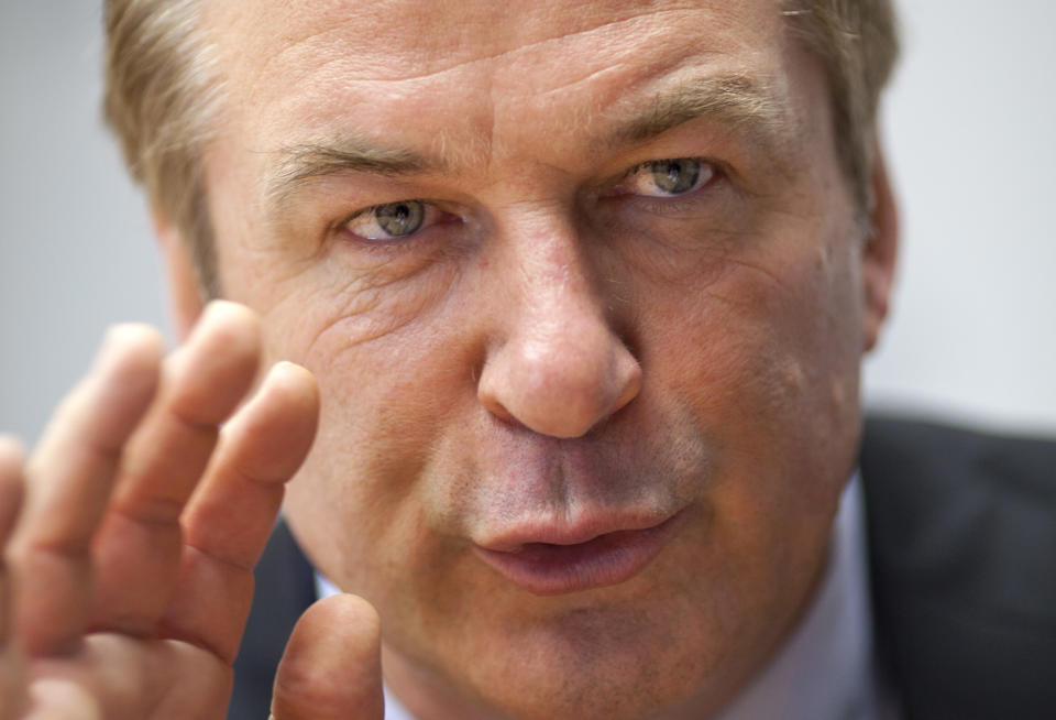 Alec Baldwin gestures during an interview with The Associated Press in Washington, Monday, April 16, 2012, Alec Baldwin is going to Congress to ask for sustained federal funding for arts programs amid the ever tight budget climate. (AP Photo/J. Scott Applewhite)