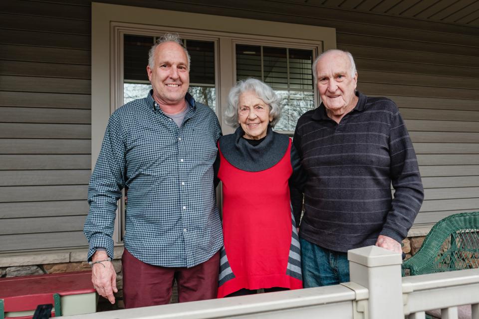 Todd Bonvechio, left, his mother Norma and father, Gene, pose for a portrait at the family home in New Philadelphia.