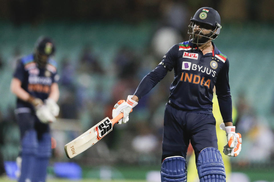 India's Ravindra Jadeja walks from the field after he was dismissed during the one day international cricket match between India and Australia at the Sydney Cricket Ground in Sydney, Australia, Friday, Nov. 27, 2020. (AP Photo/Rick Rycroft)