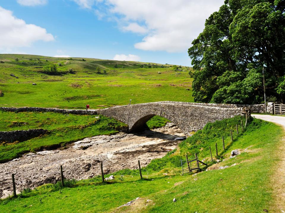 Yorckethwaite Bridge over a dry River Wharfe in Langstrothdale Upper Wharfedale Yorkshire Dales National Park North Yorkshire England