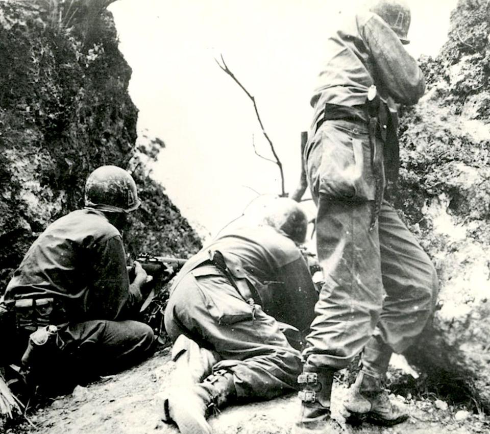 An Army photo shows Louis Giarrusso’s unit, the 305th Infantry Regiment, fighting on Okinawa in 1945.
