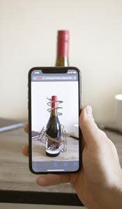 Agency Rock Paper Reality used 8th Wall's Curved Image Targets technology to bring a Siduri Wine bottle to life with web-based augmented reality, no app required.